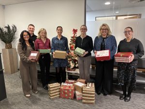 CKT colleagues holding Carepacks