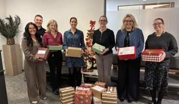 CKT colleagues holding Carepacks