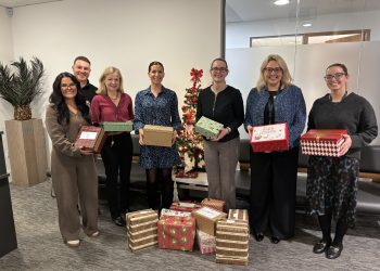 CKT colleagues holding Carepacks