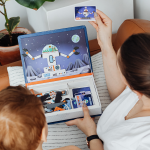 Mother showing child a spaceperson card
